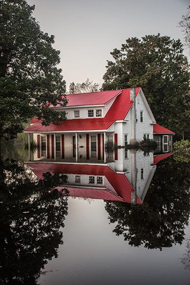 A local pastor's home, which succumbed to flood waters in Burgaw, North Carolina.<br/>