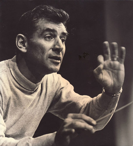 A young Leonard Bernstein leading his orchestra in a rehearsal, New York, 1958