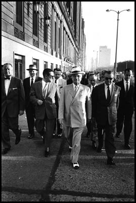 Harry S. truman walking to the 1956 Democratic Convention in Chicago