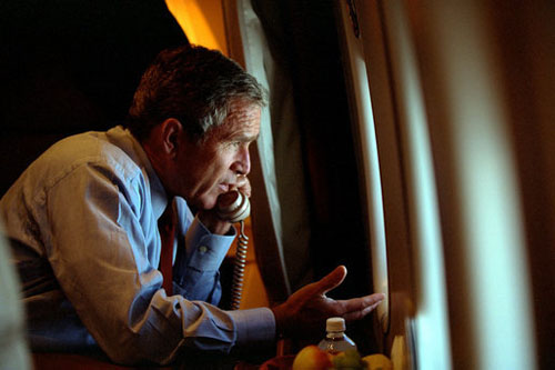 George Bush, speaks to vice president Dick Cheney by phone aboard Air Force One after departing Offutt air force base in Nebraska, Tuesday September 11, 2001
