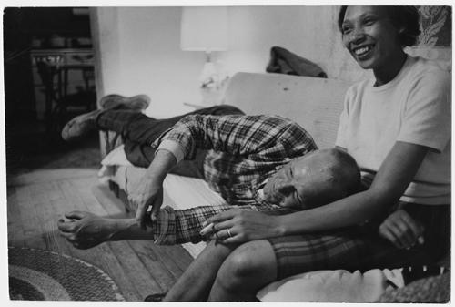 Photo: Richard and Mildred Loving laughing and watching television in their living room, King and Queen County, Virginia Archival Pigment Print #1430