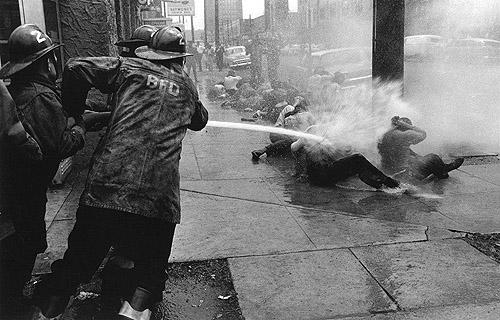 Fire hoses aimed at Demonstrators, Birmingham, Alabama, 1963<br/>
