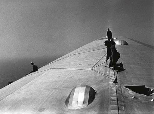 Â©Time Inc. Repairing the Hull of the Graf Zeppelin during the Flight over the Atlantic, 1934