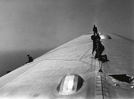 Â©Time Inc. Repairing the Hull of the Graf Zeppelin during the Flight over the Atlantic, 1934 Gelatin Silver print