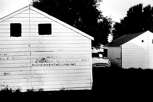 "I Love Anybody..." Migrant Camp Cabin, Arkansas, 1961