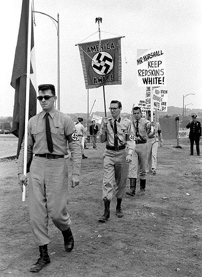 Members of the American Nazi Party marching against desegregating the Washington Redskins, District of Columbia Stadium, Washington, DC, 1961<br/>