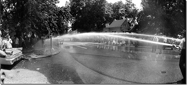 FRANCIS MILLER - Police turning fire hoses onto protesters against school integration, Little Rock, Arkansas, 1959