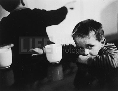 Immigrant Child waiting at Ellis Island, 1950