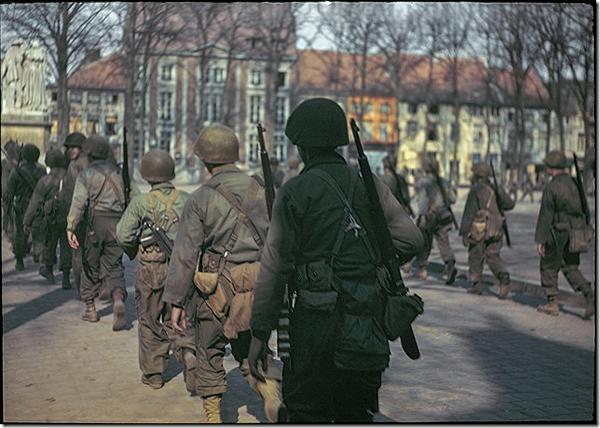 Soldier Marching, Ottre, Belgium, 1944 Archival Pigment Print