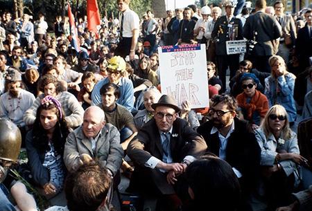 Playwright Jean Genet demonstrates in Grant Park Chicago 1968 against Chicago Mayor Daley's police. Next to him is novelist William Burroughs and novelist Terry Christian who wrote "The Magic Christian."<br/>