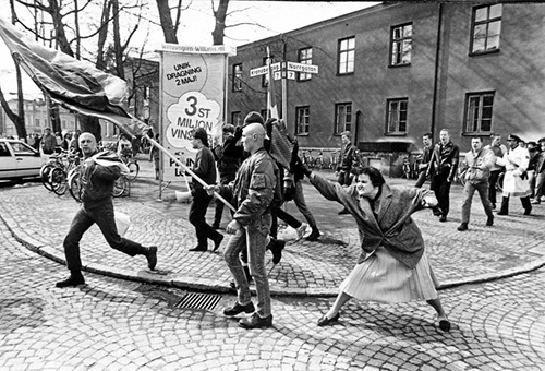 A woman hitting a neo-Nazi with her handbag, Växjö, Sweden, 1985