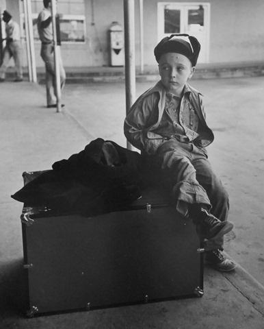 Boy on suitcase, Houston, Texas, 1950<br/>