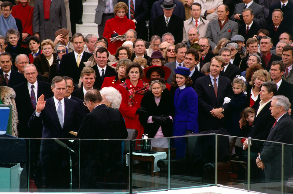 United States President George H.W. Bush takes the oath of office during the Inauguration Day ceremony on the West Front of the Capitol Building. Washington, DC, January 20, 1989