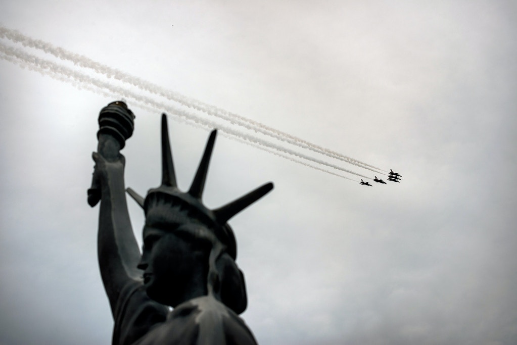 The Air Force Thunderbirds fly F-16s over a Hudson River pier during Air Force Week in New York in 2012.