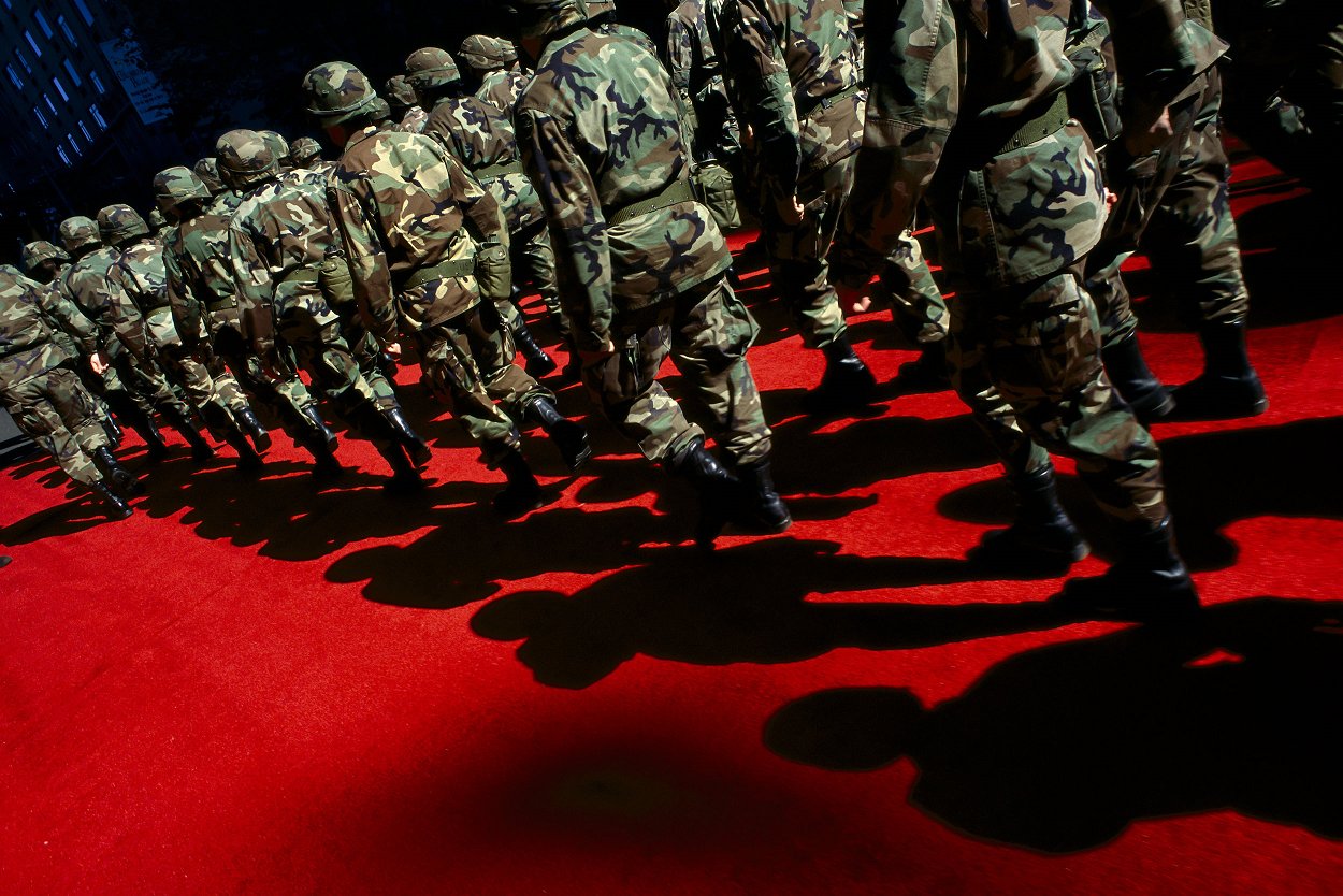 Soldiers on Red Carpet, Columbus Day Parade held after the first day of bombing of Afghanistan, New York, 2001