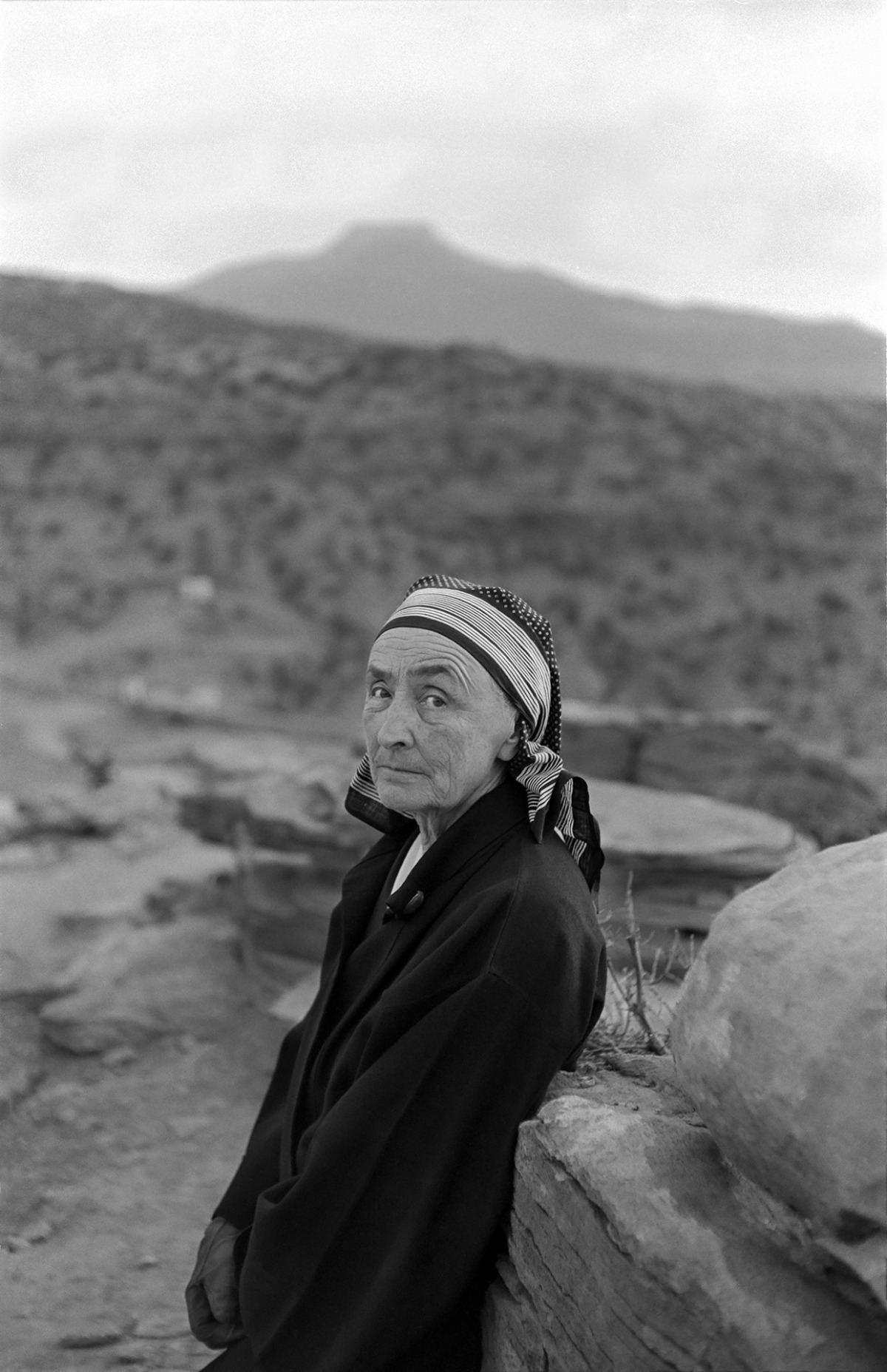 Georgia O'Keeffe with Pedernal Mountain, Abiquiu, 1960