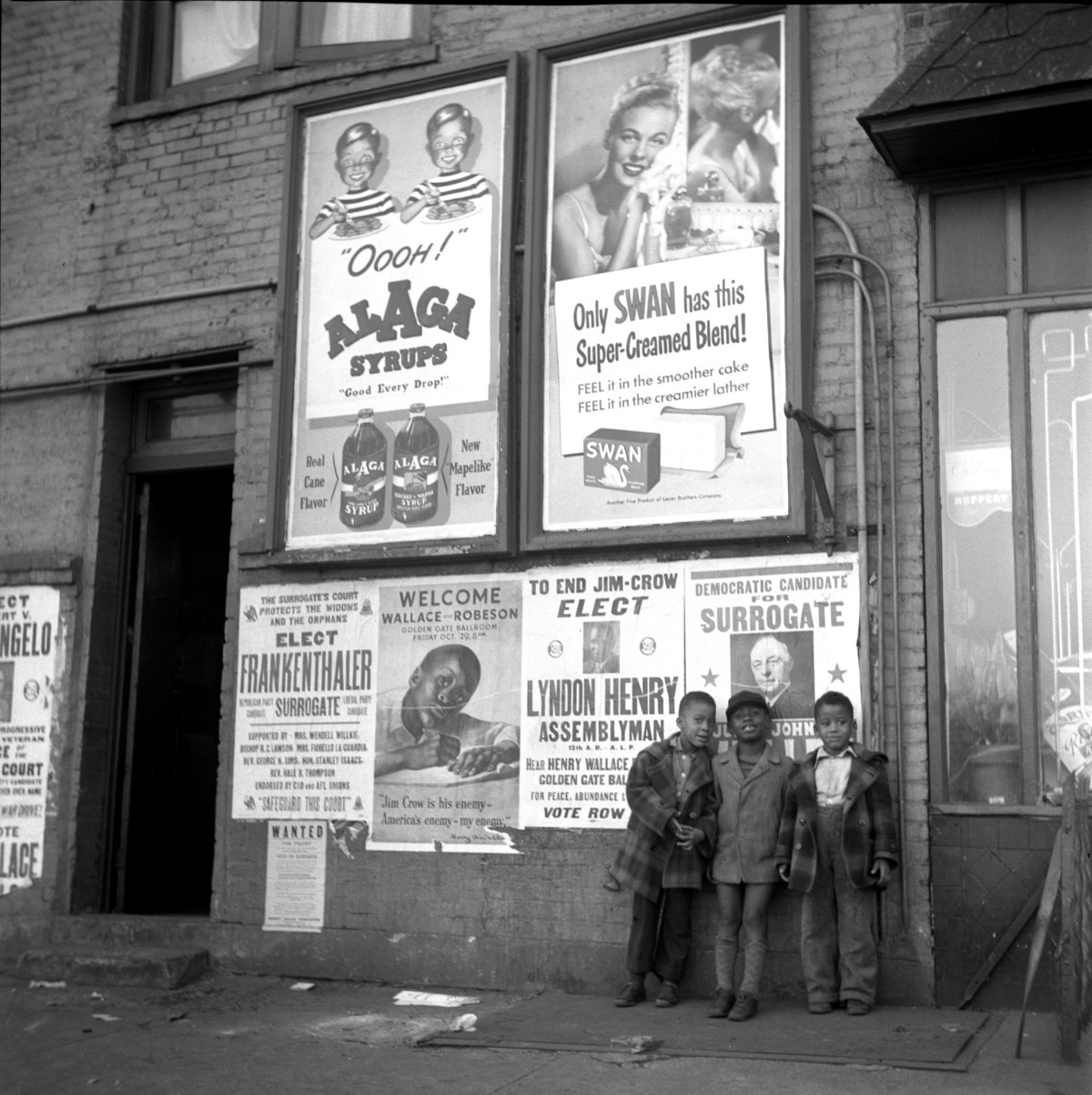 Boys at poster wall. New York City c.1946-1950