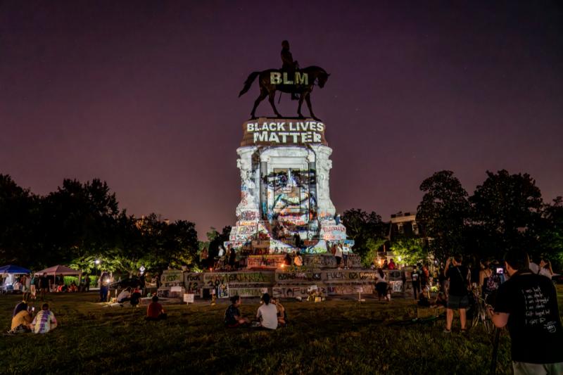 Mark Peterson Portrait of George Floyd projected on General Robert E. Lee statue in Richmond VA June 8 2020 by lighting designer Dustin Klein <br/>Please contact Gallery for price