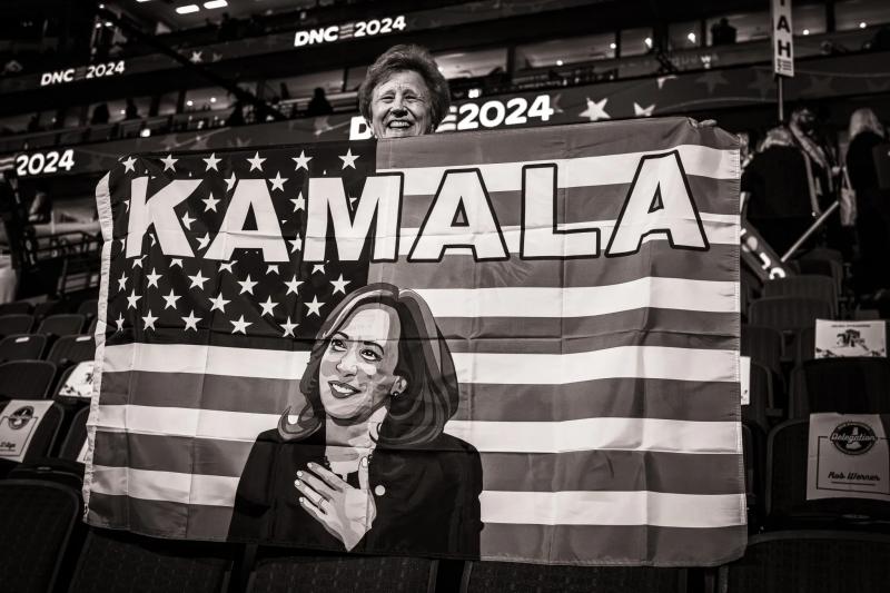 A Woman holding a Kamala American flag at the Democratic National Convention, 2024<br/>Please contact Gallery for price