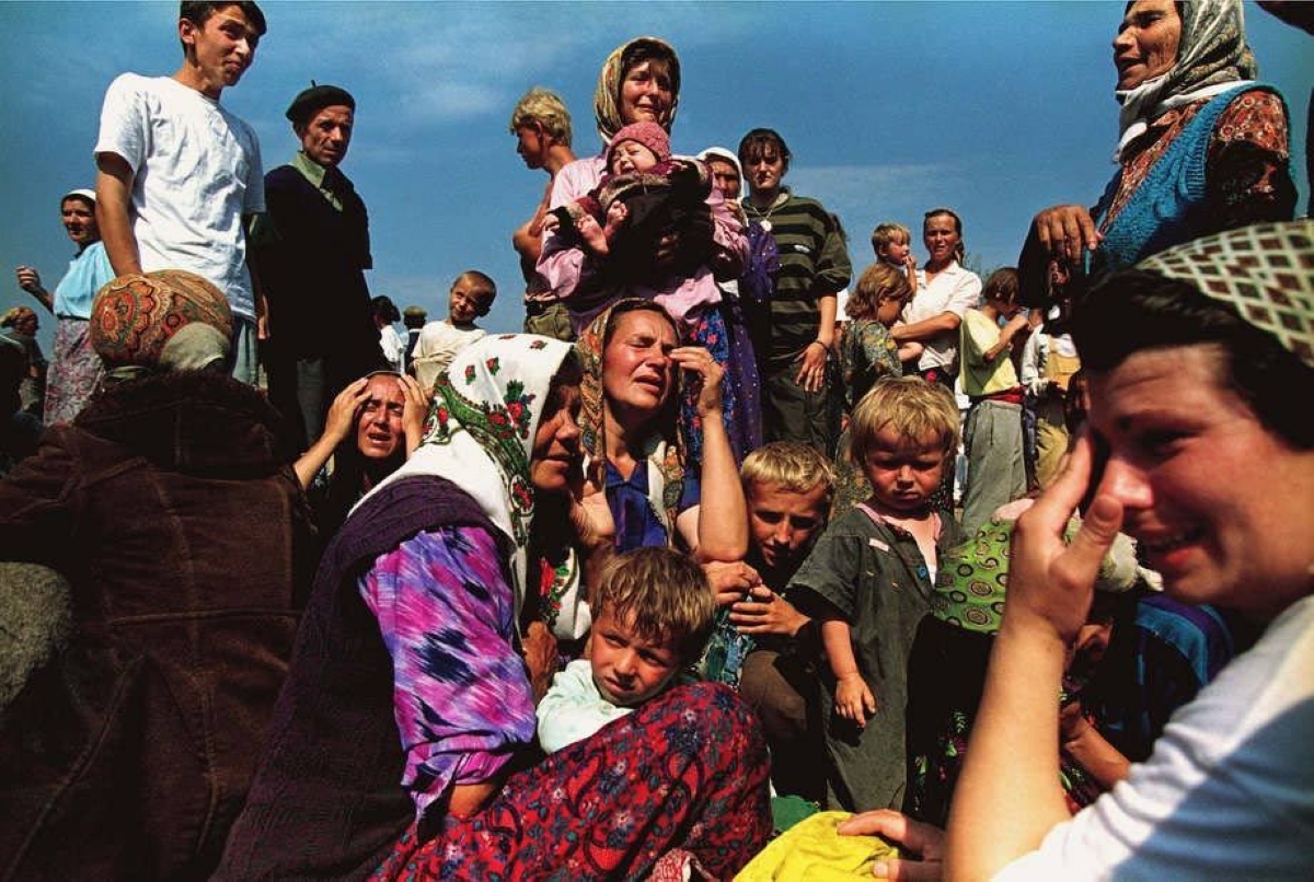 Survivors of the Serbian attack on Srebrenica learn of the fall of the United Nations safe haven. More than 8,000 Bosnian men were killed and the event was declared genocide. Tuzla, Bosnia  1995