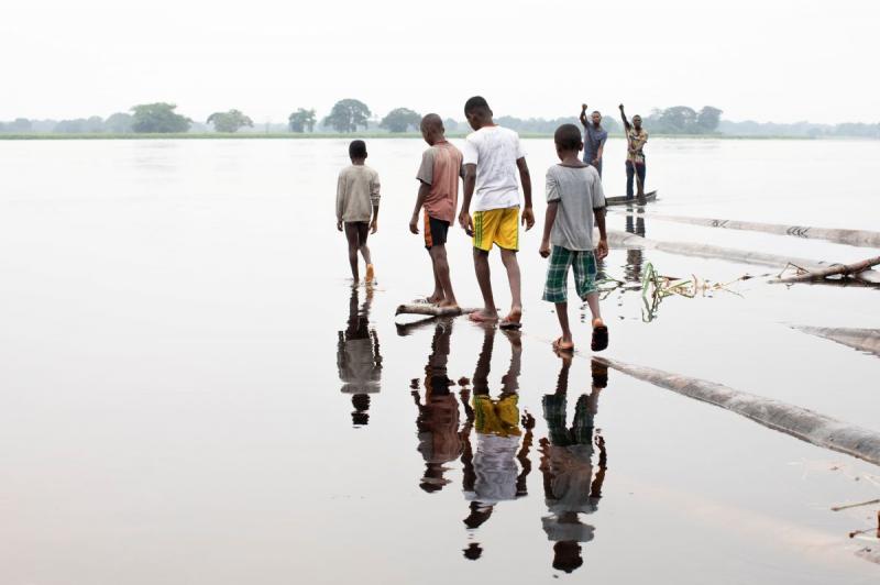 Photo: School children gathered along the Congo River, Democratic Republic of Congo, 2022 Archival Pigment Print #3021