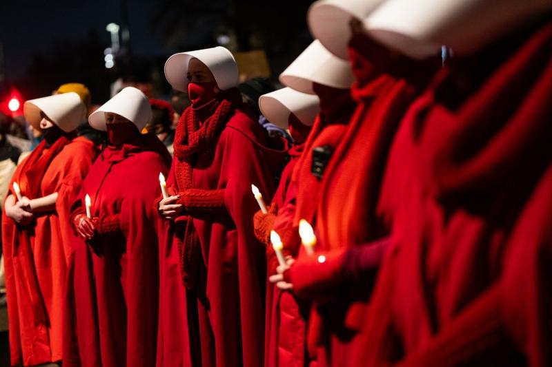 Photo: January 7th, 2026 - After the murder of Renee Good by a masked federal agent, a vigil was held in her honor. Upward of 10,000 Minnesotans showed up to pay their respects at the location she was killed Archival Pigment Print #3100
