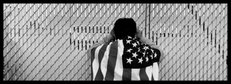 Ron Haviv Chicago protestor with American flag outside ICE facility, 2025 Please contact Gallery for price