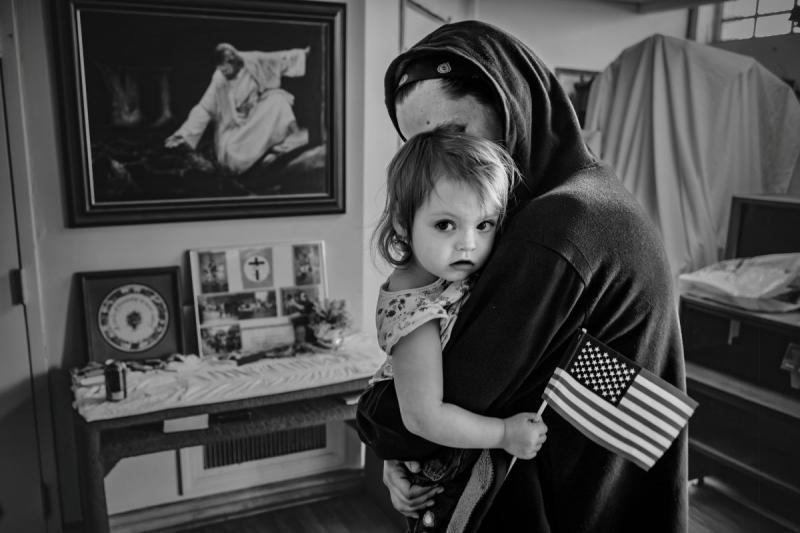 Eric Smith Father with daughter. Peacemakers International church – Chene St., Detroit., 2015 Please contact Gallery for price