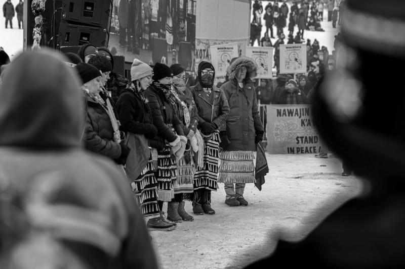 Eugene Tapahe Ceremonial Medicine, Powderhorn Park, Minneapolis, Minnesota, Native land of the Dakȟóta and Lakȟótiyapi people, jingle dress ceremonial dance for the families of Renee Good, Alex Pretti, and the Minneapolis community, 2026 Please contact Gallery for price