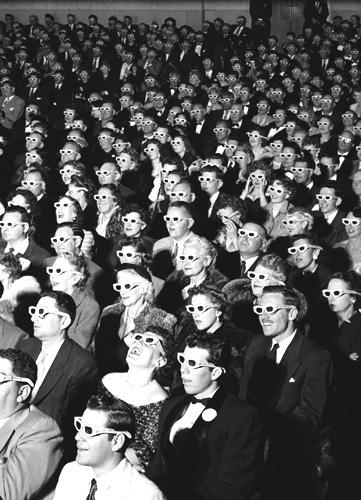 Watching "Bwana Devil" in 3-D at the Paramount Theater, Hollywood, 1952<br/>