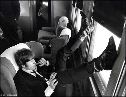 John Lennon on the train from New York to Washington for the Beatles' concert at Washington Coliseum, Feb. 11, 1964<br/>