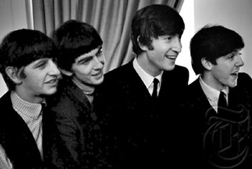 Ringo Starr, George Harrison, John Lennon and Paul McCartney greet the press at the Plaza Hotel in New York, February 1964