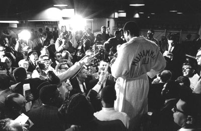 Ali speaks to the media before a fight