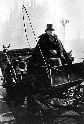 Coachman waits for a fare near La Scala, Milan, 1934