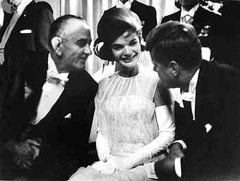 President John F.Kennedy with his wife, Jacqueline, and Vice-President Lyndon B. Johnson at inaugural celebration, Mayflower Hotel, Washington, DC, 1961<br/>