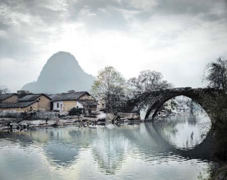Snowy bridge and mountain, China<br/>0<br/>