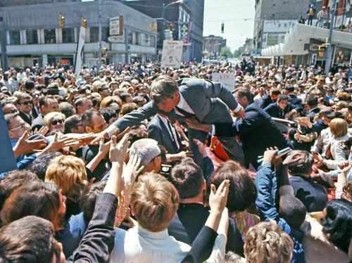 Bobby Kennedy with crowd in a Midwest city after entering the 1968 Presidential race<br/>