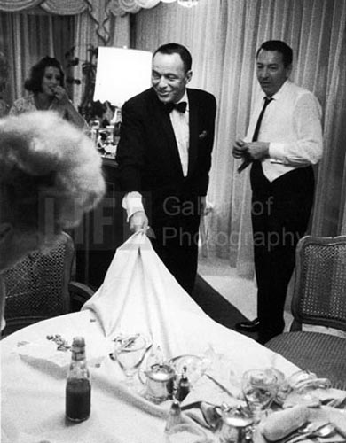 Frank Sinatra yanks tablecloth, Miami, 1965