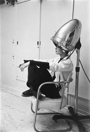 Photographed for LIFE in 1953, Audrey Hepburn, under the hair dryer during the making of