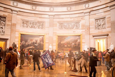 Insurrectionists in the Rotunda of US Capitol