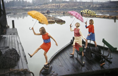 color photo of models with umbrellas in Finland
