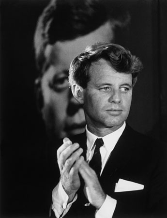 Robert F. Kennedy in front of a poster of his brother, Columbus, Ohio, 1968