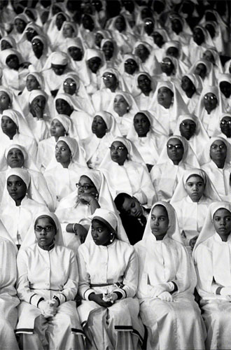 Muhammed's Grandchild in Center with Black Muslim Sisters, 1969